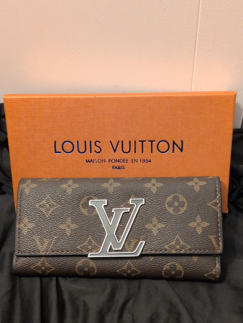 Louis Vuitton Brown Monogram Wallet with Silver LV Logo